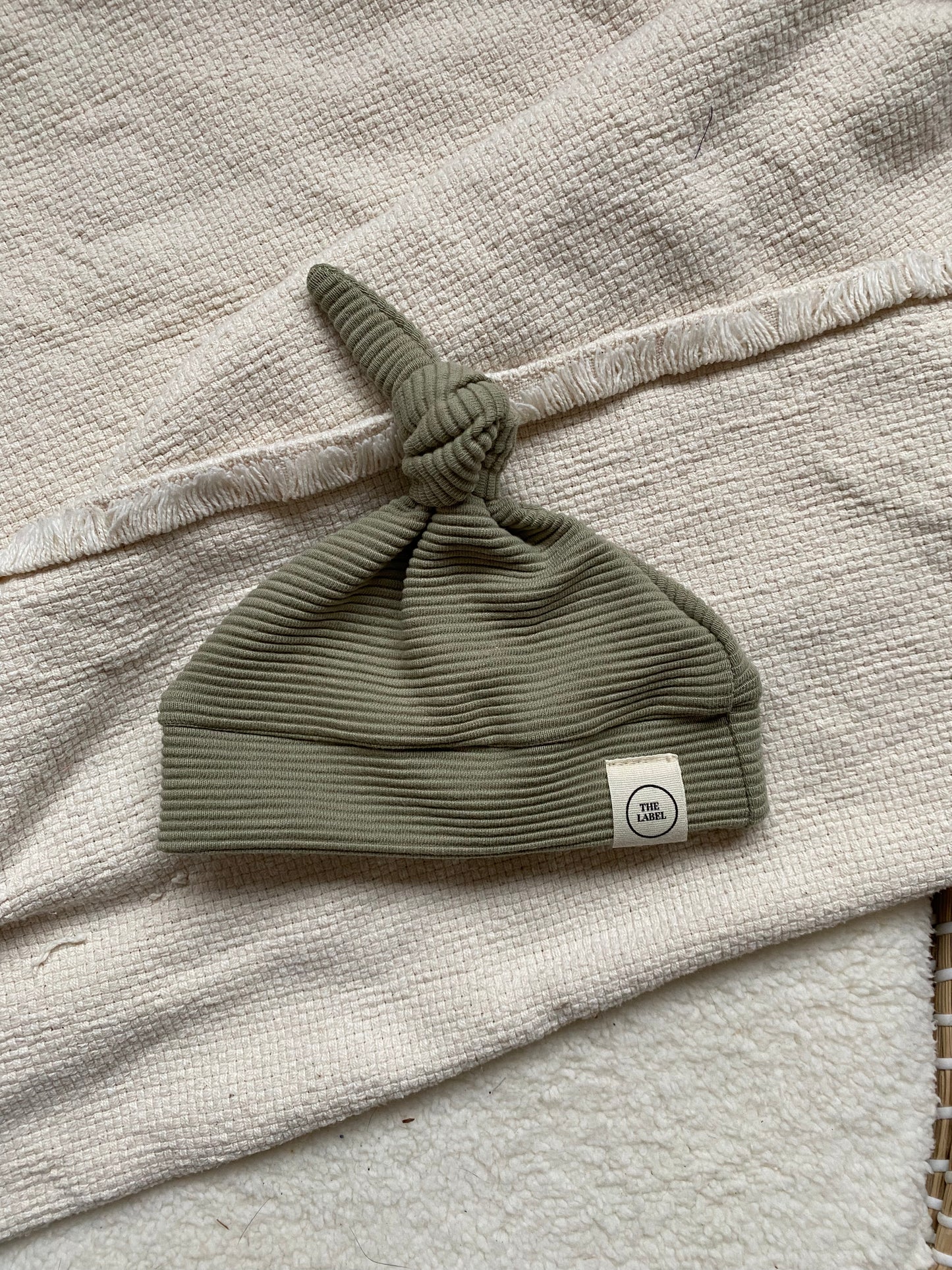 Knoopmutsje | Moos rib groen