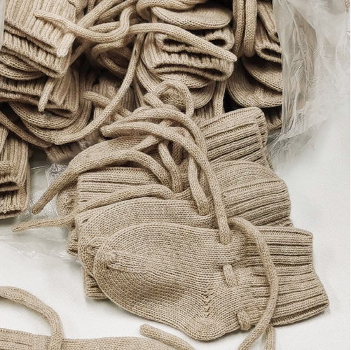 Merinowollen baby slofjes zand