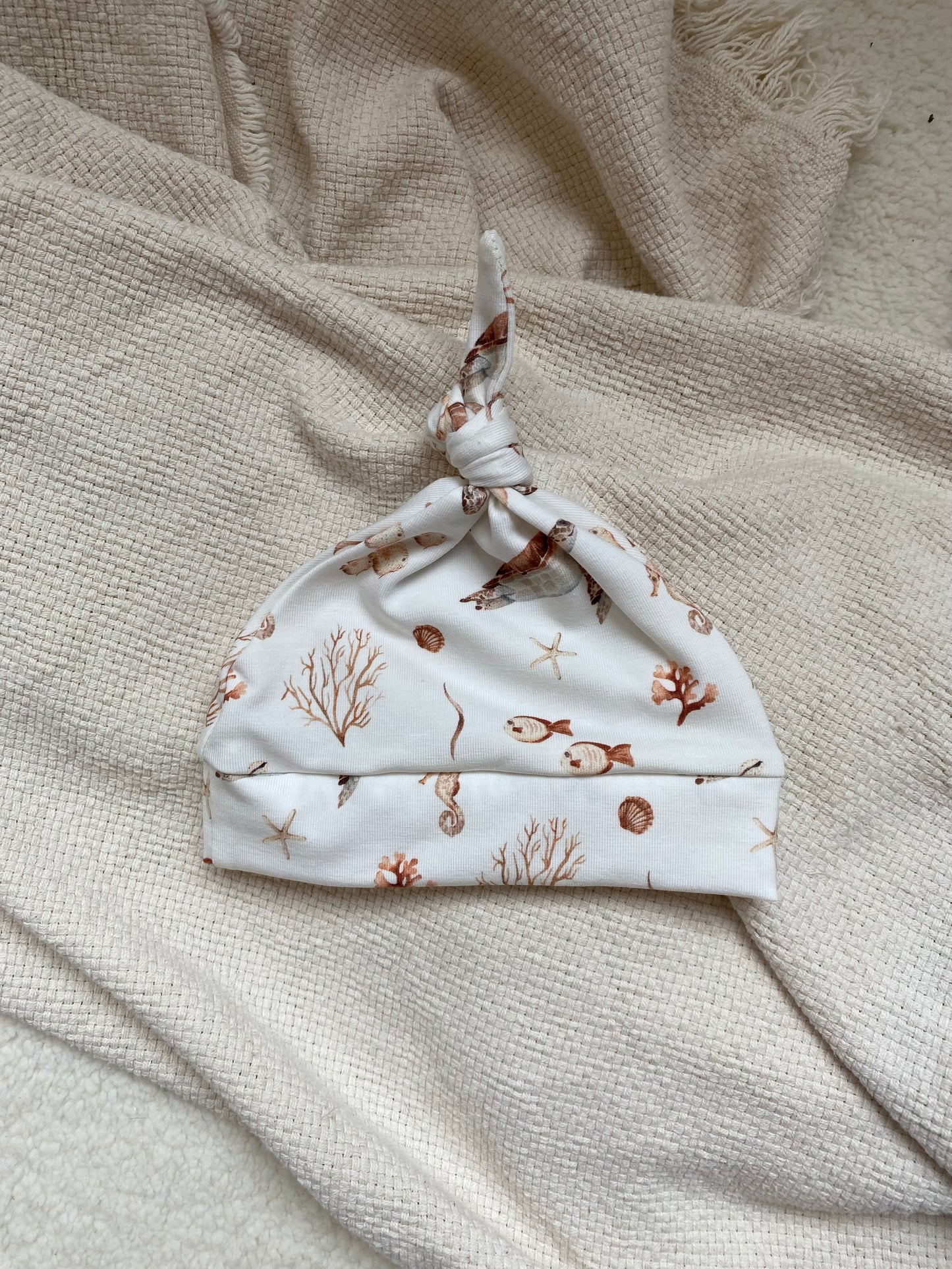 Knoopmutsje | Louan zeedieren