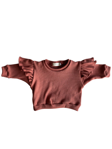 Meisjes trui met grote ruffles brique ribstof