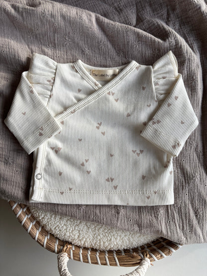Meisjes overslagshirtje ruffle Lia hartjesprint beige