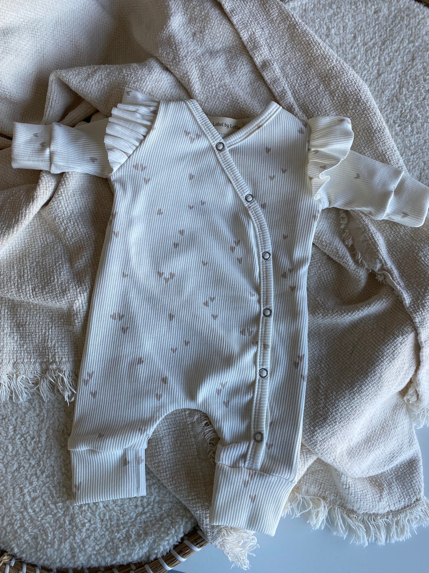 Meisjes boxpakje Lia hartjesprint beige ribstof