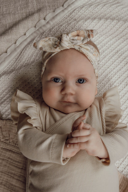 Meisjes overslagshirtje ribstof beige ruffle