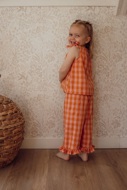 Broek met ruffle ruitjes oranje roze