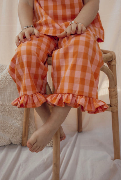 Broek met ruffle ruitjes oranje roze