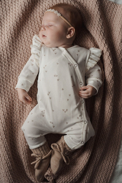 Meisjes boxpakje Lia hartjesprint beige ribstof