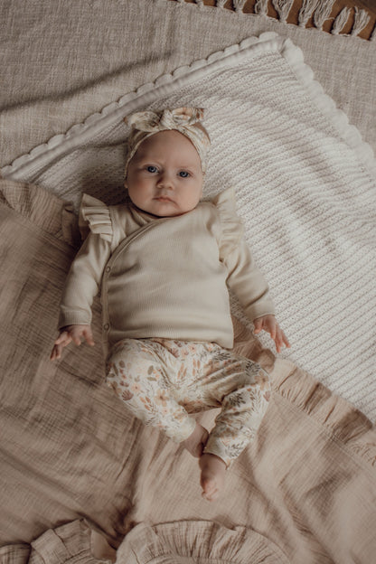 Meisjes overslagshirtje ribstof beige ruffle