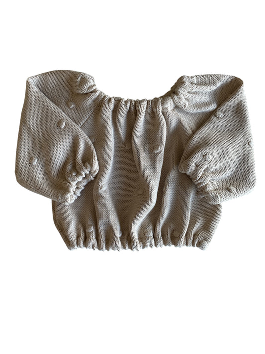 Gebreide meisjes trui met stippen beige