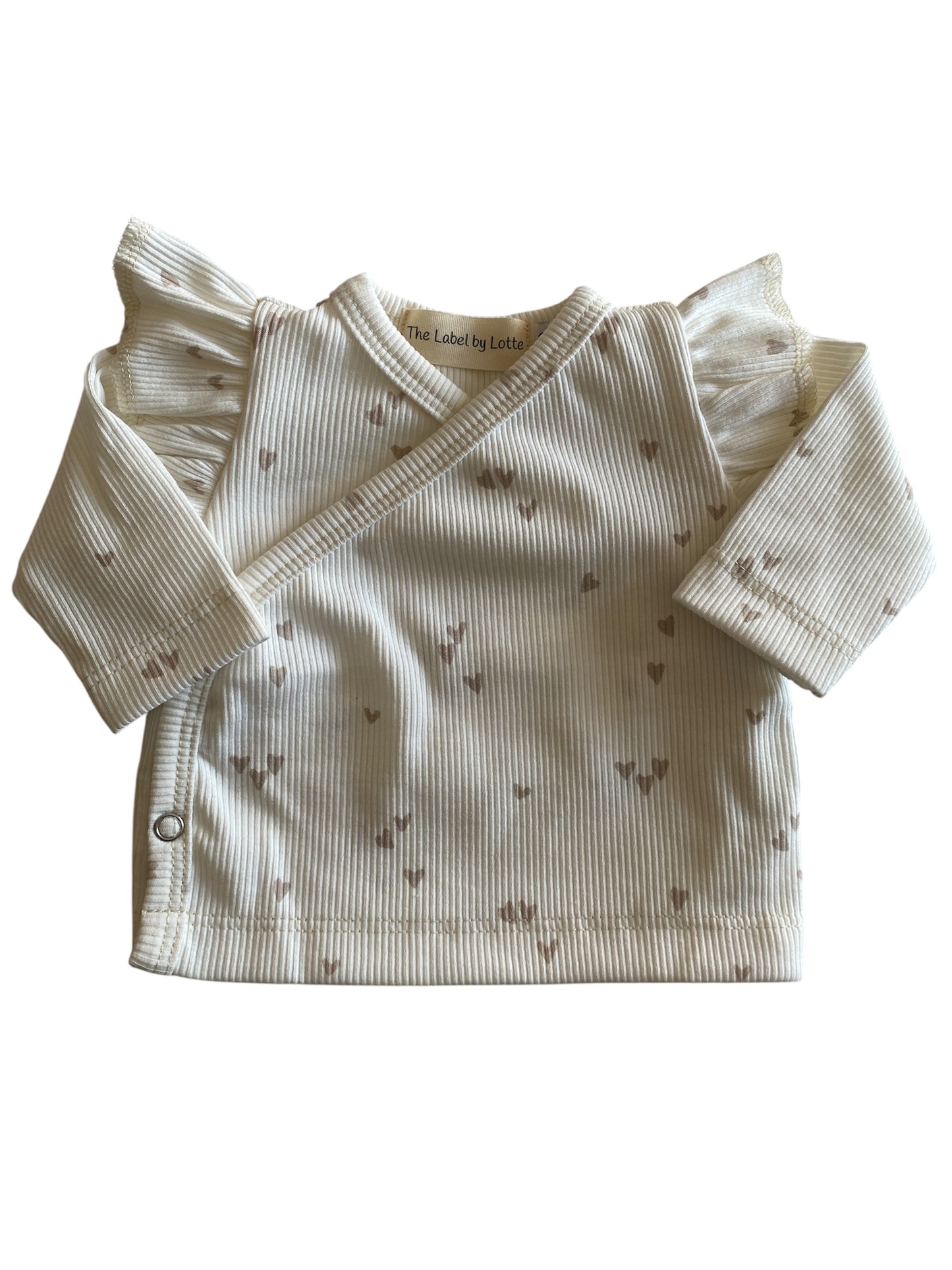 Meisjes overslagshirtje ruffle Lia hartjesprint beige