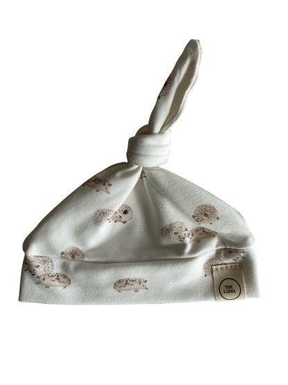 Uniseks knoopmutsje egeltjesprint offwhite beige