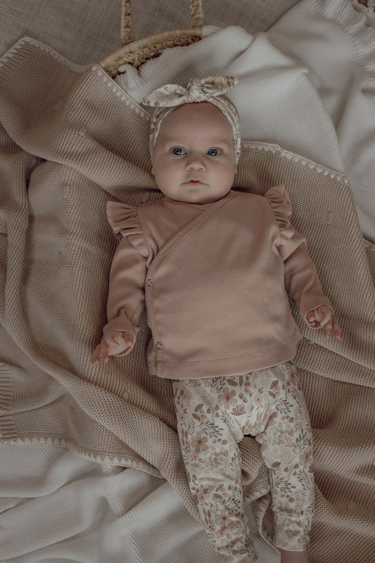 Meisjes overslagshirtje ribstof blush roze ruffle