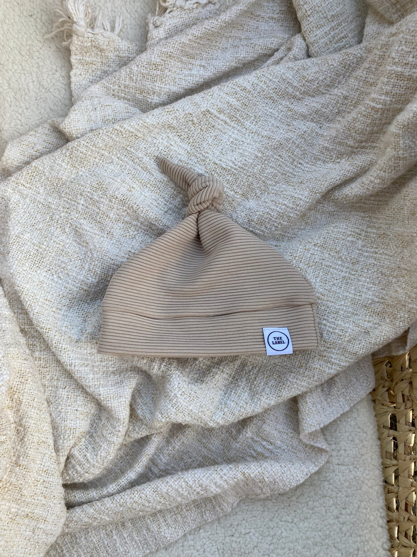 Knoopmutsje | Sam rib zand